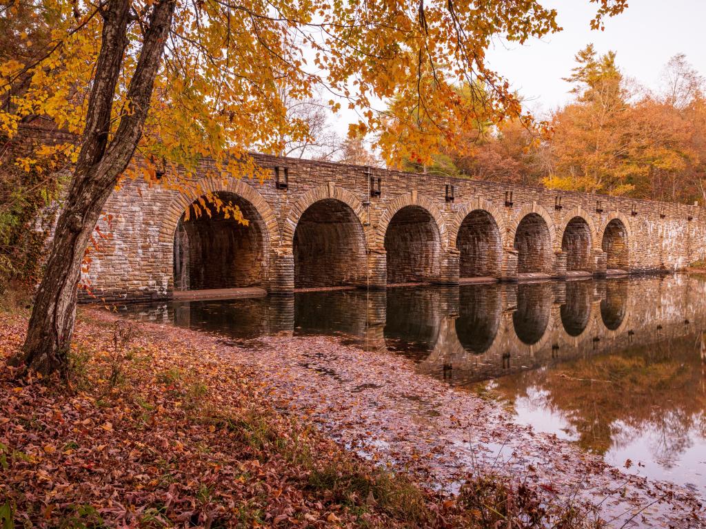 The beautiful bridge in Cumberland Mountain State park on a tranquil fall day.