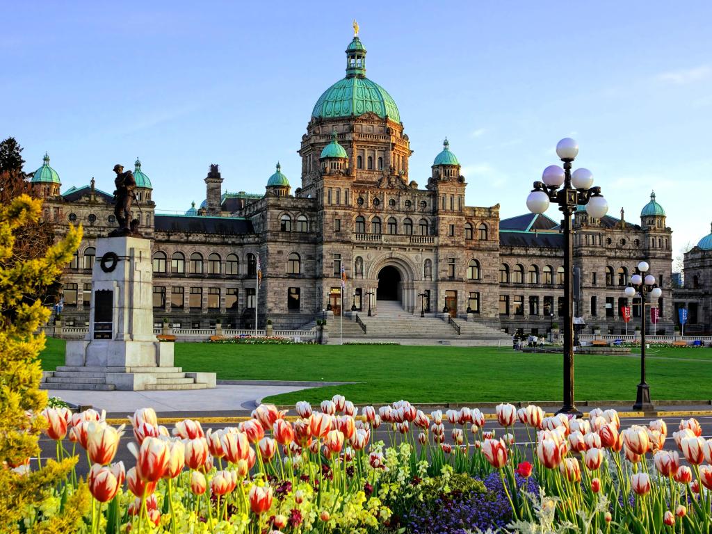 Historic British Columbia provincial parliament building, spring tulips in the foreground