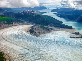 Aerial view of Glacier Bay National Park, Alaska, with the glacier close up in the foreground