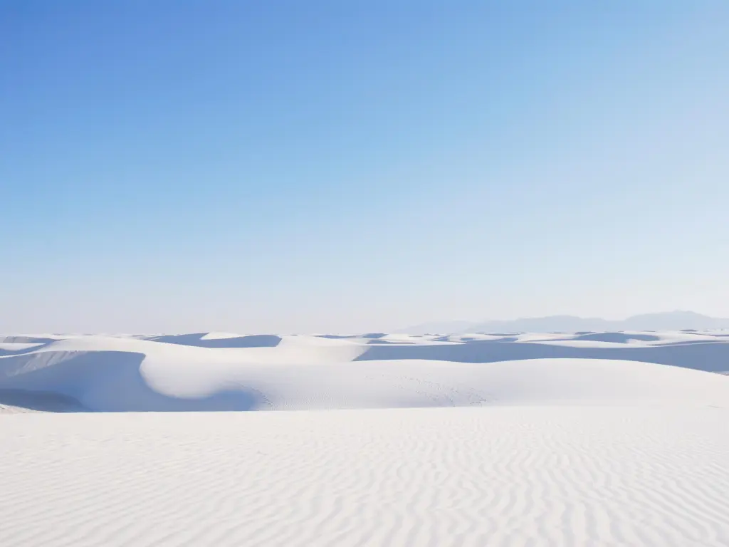 Beautiful expansive white sand dunes under the blue sky