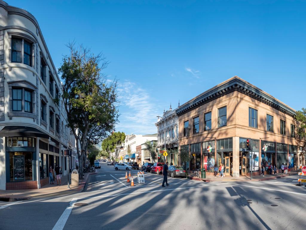 People walking between historic buildings on the main Monterey Street in San Luis Obispo