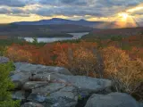 Sun setting on Catskills Mountains of New York, photo taken from Sunset Rock during fall with an HDR setting