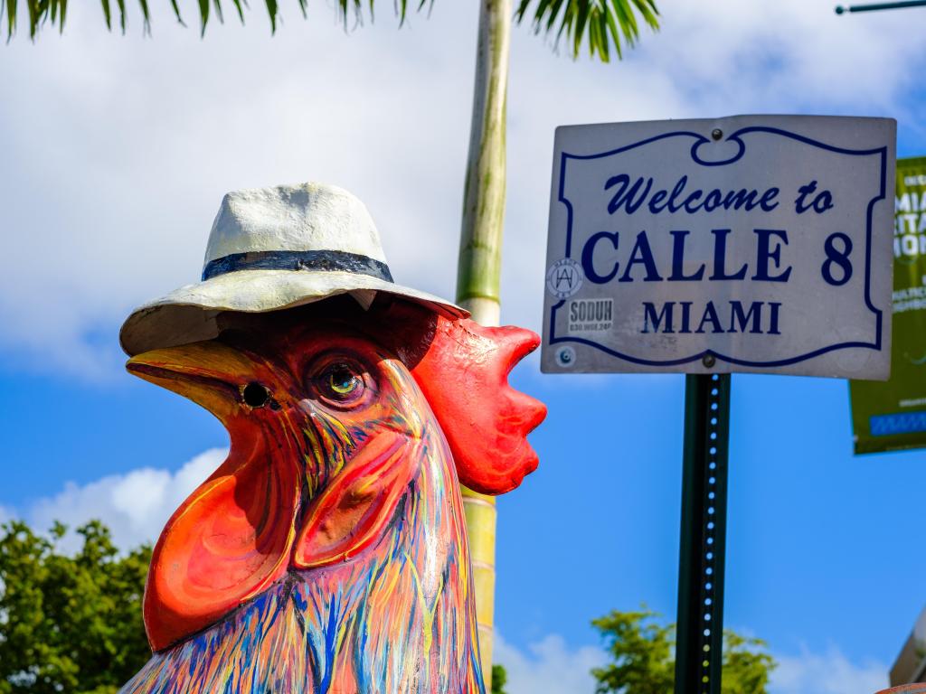 Colorful statue of a rooster wearing a hat and smoking a cigar in Little Havana