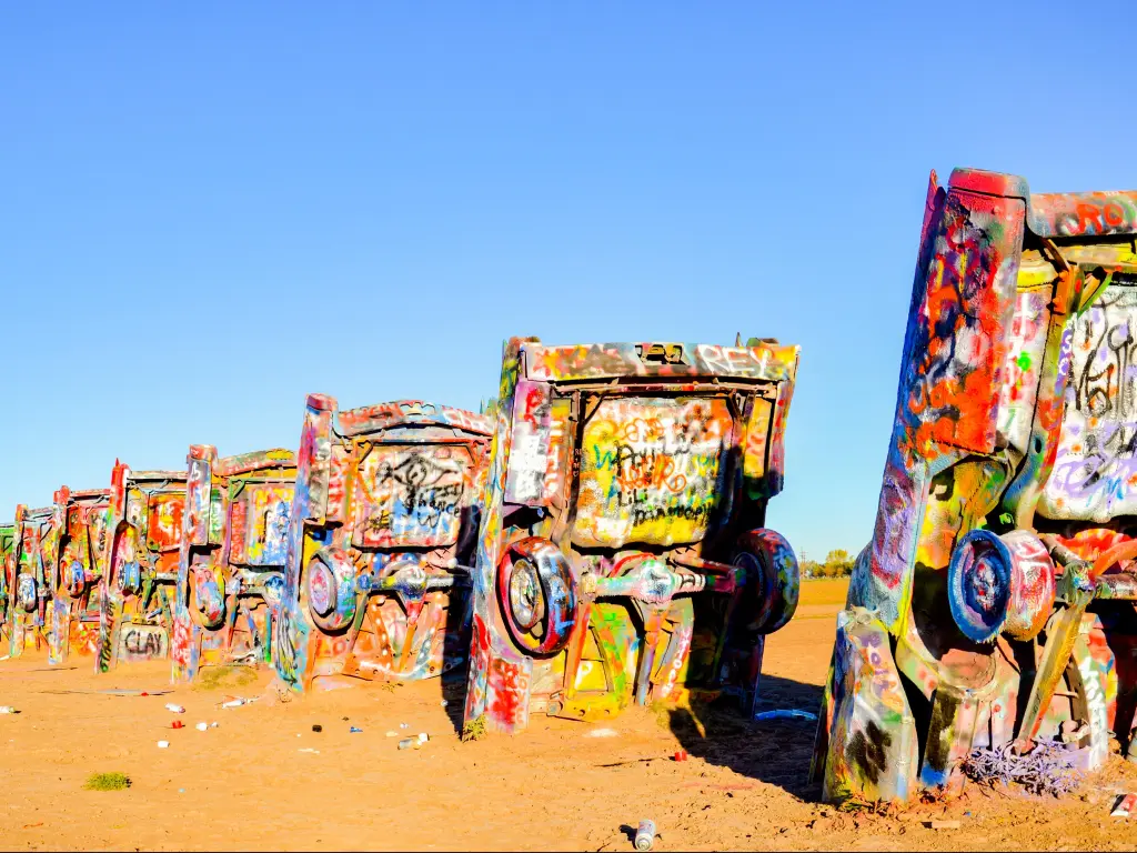 Cadillac Ranch, Amarillo, Texas, USA with a view of the public art installation and sculpture in Texas, U.S. created in 1974 by Chip Lord, Hudson Marquez and Doug Michels, of the art group Ant Farm