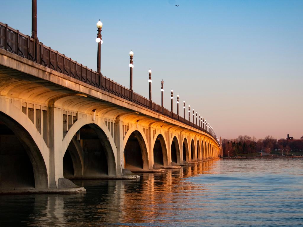 View of the right side of the MacArthur bridge from the ground under bridge. The bridge links downtown Detroit and Belle Isle Michigan State Park and serves as the entrance