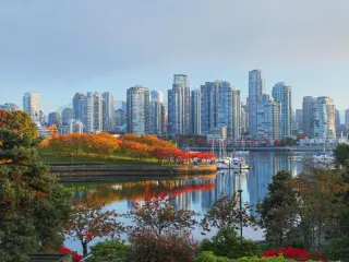 Vanvoucer skyline during fall with the reflection of skyscrapers in the water
