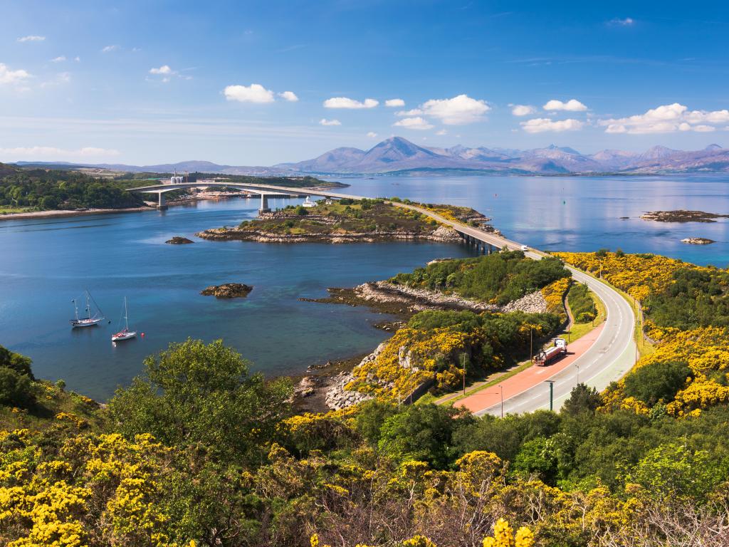 Skye Bridge, Isle of Skye, on a sunny day with cars going over to the island