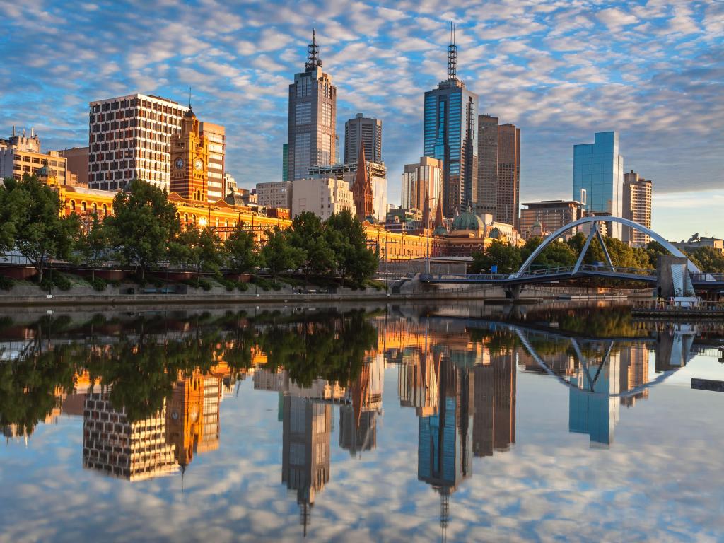 Melbourne skyline from Southbank during a partially cloudy day with blue skies