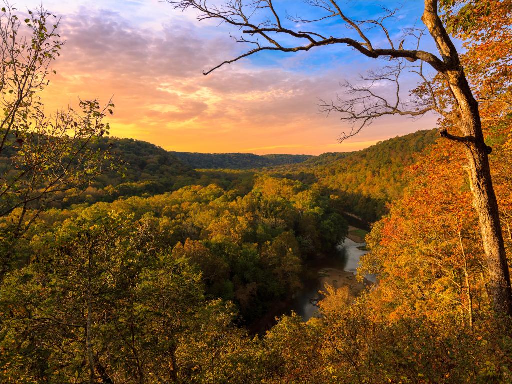Mammoth Cave National Park, Kentucky, USA with the sun setting over the Green River at Mammoth Cave National Park during fall.