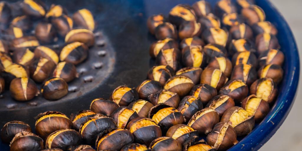A close up of chestnuts cooking 