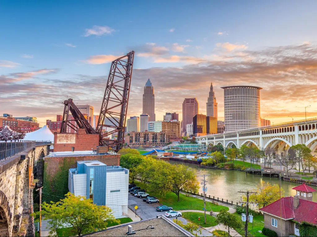 Cleveland, Ohio, USA skyline on the river at sunset.