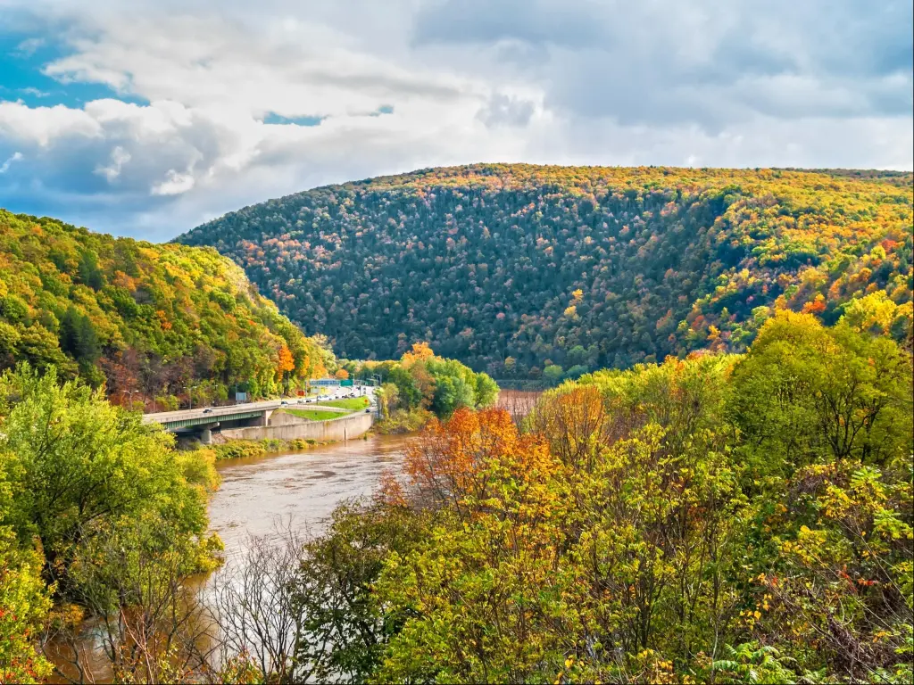 A scenic view of the Delaware Water Gap National Recreation Area during a sunny autumn day