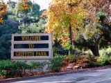Griffith Park Entrance Sign surrounded by autumnal trees