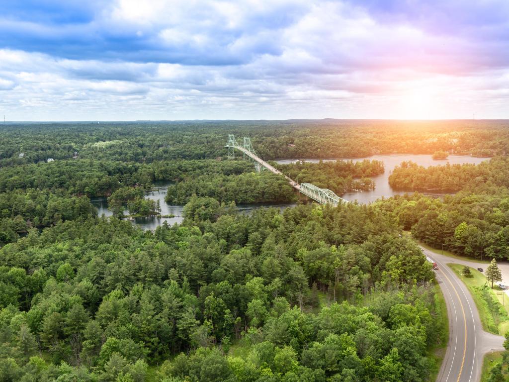 Aerial view of road across forested, flat islands