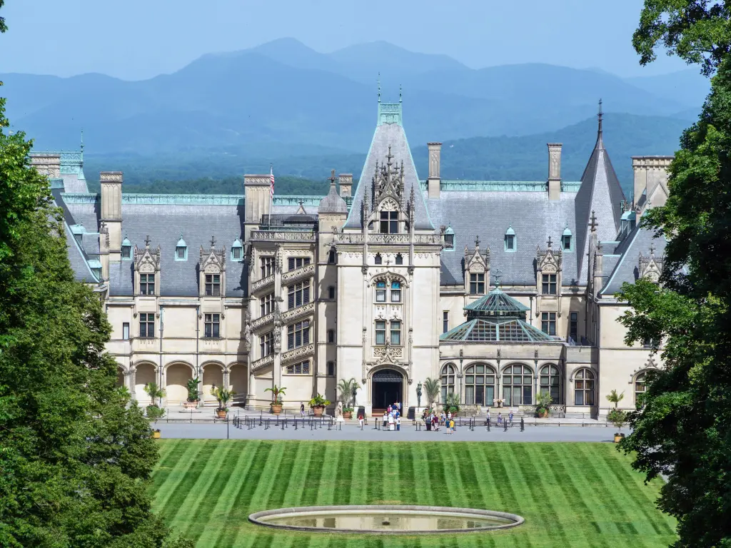 A view on the facade of the expansive Biltmore Estate on a misty day
