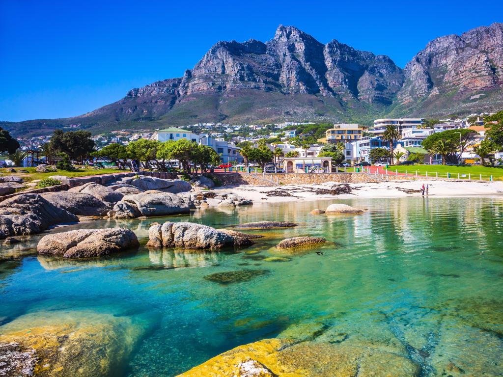 Cape Town, South Africa taken as a panorama of with the city beach against the magnificent mountains taken on a sunny day.