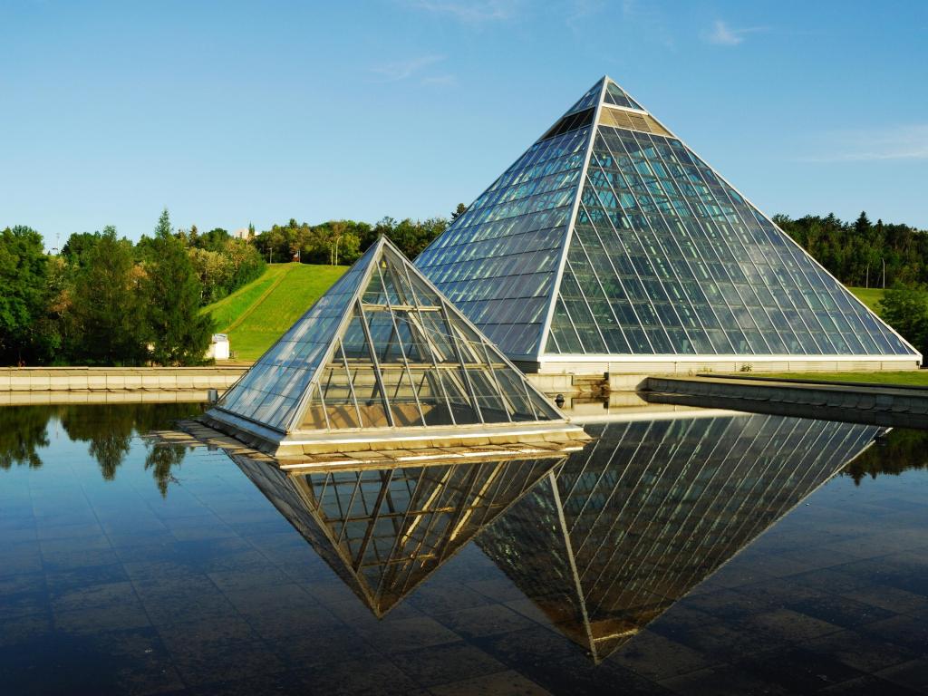 Muttart conservatory dome surrounded by greenery in Edmonton city, Alberta, Canada