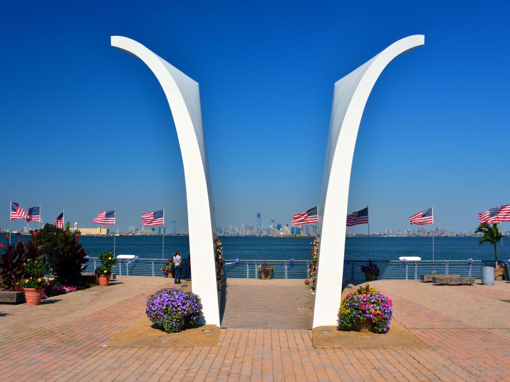 Staten Island September 11 memorial with American flags and flowers