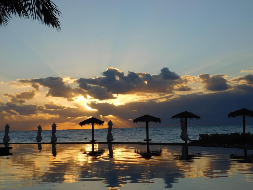 Sunrise and reflection over Infinity Pool in Free port Bahamas
