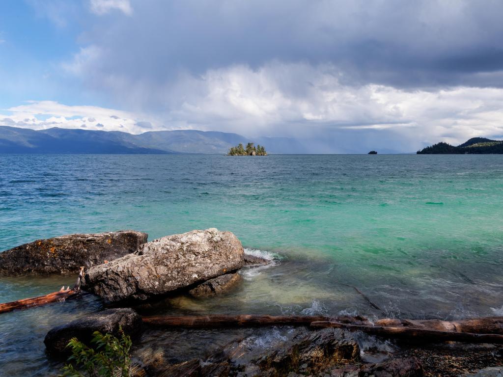Flathead Lake, Montana, USA with a view of the lake when an ominous storm was approaching. Mountains in the distance.
