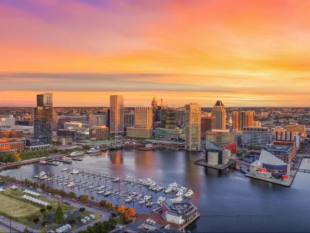 Baltimore, Maryland, Inner Harbor Skyline Aerial at sunset