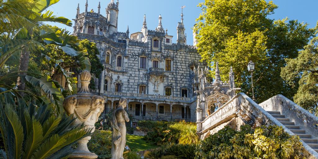 Palace surrounded by trees in Quinta de Regaleira, Sintra