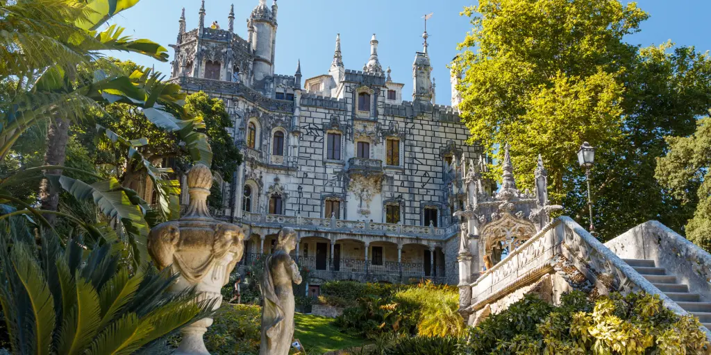 Palace surrounded by trees in Quinta de Regaleira, Sintra