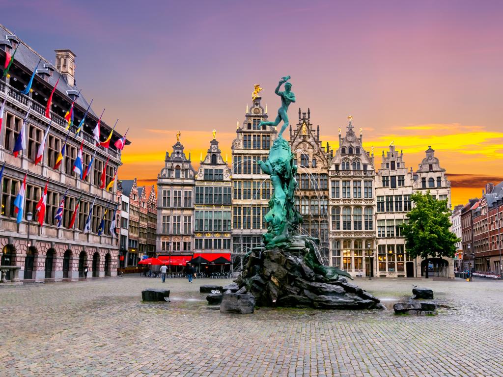 Brabo fountain on Market square, centre of Antwerp, Belgium at sunset.