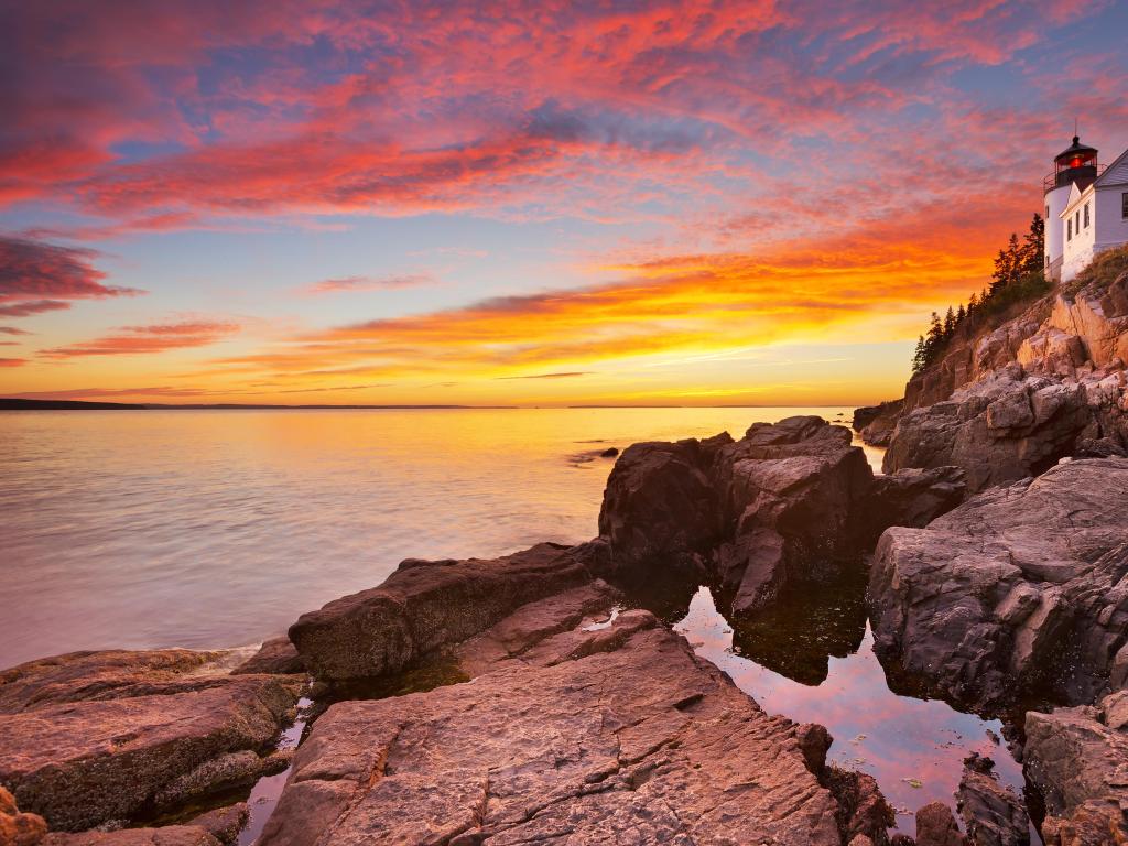 Acadia National Park, Maine, USA with a view of the Bass Harbor Head Lighthouse taken during a spectacular sunset.