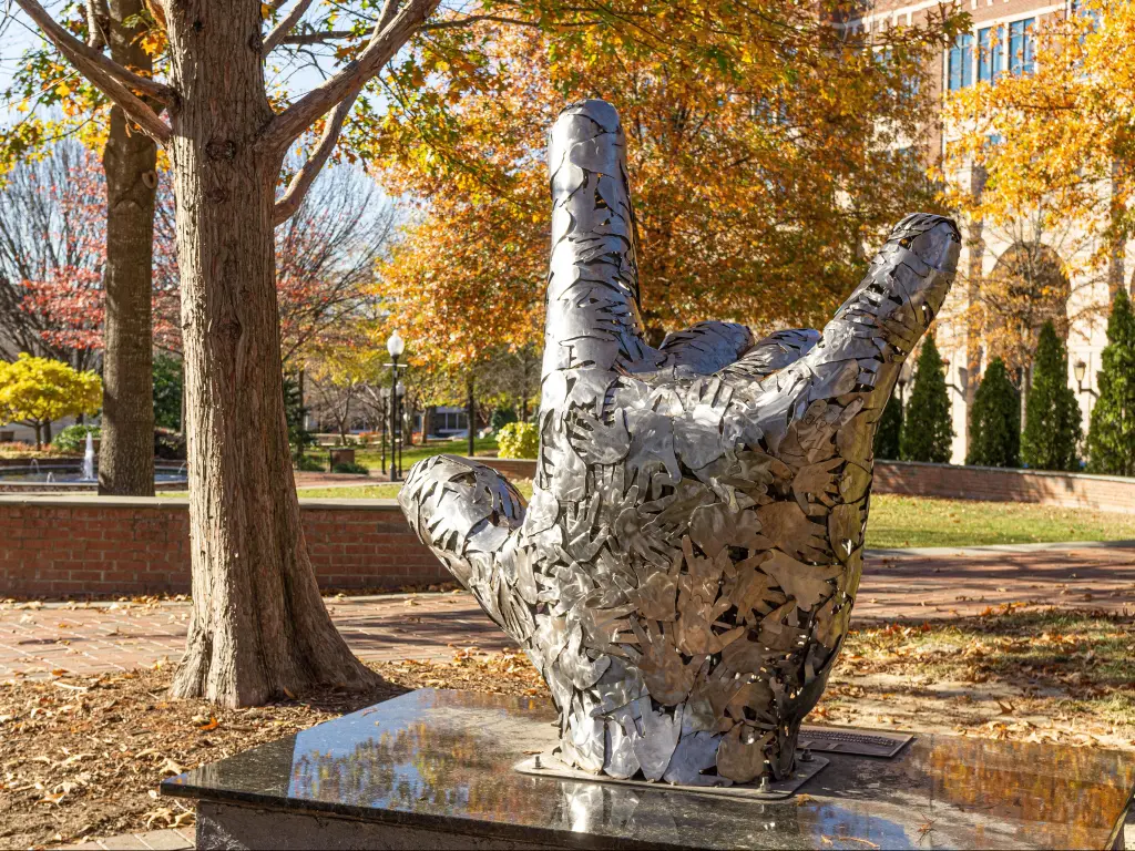 Metal hand sculpture in downtown Spartanburg signs "I Love You"