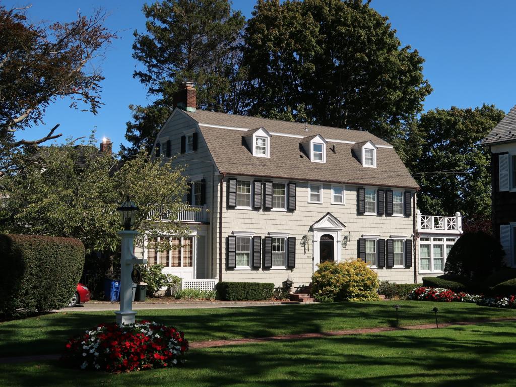 The white facade of the famous house on a sunny day