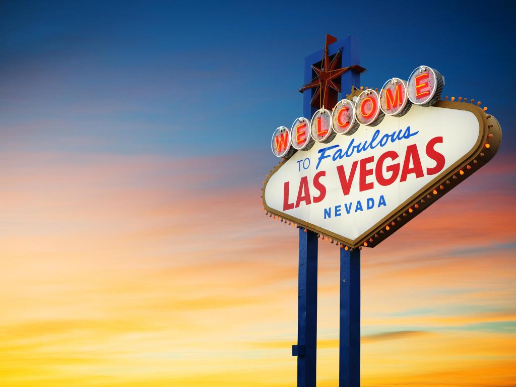 Welcome to Las Vegas sign lit up at sunset