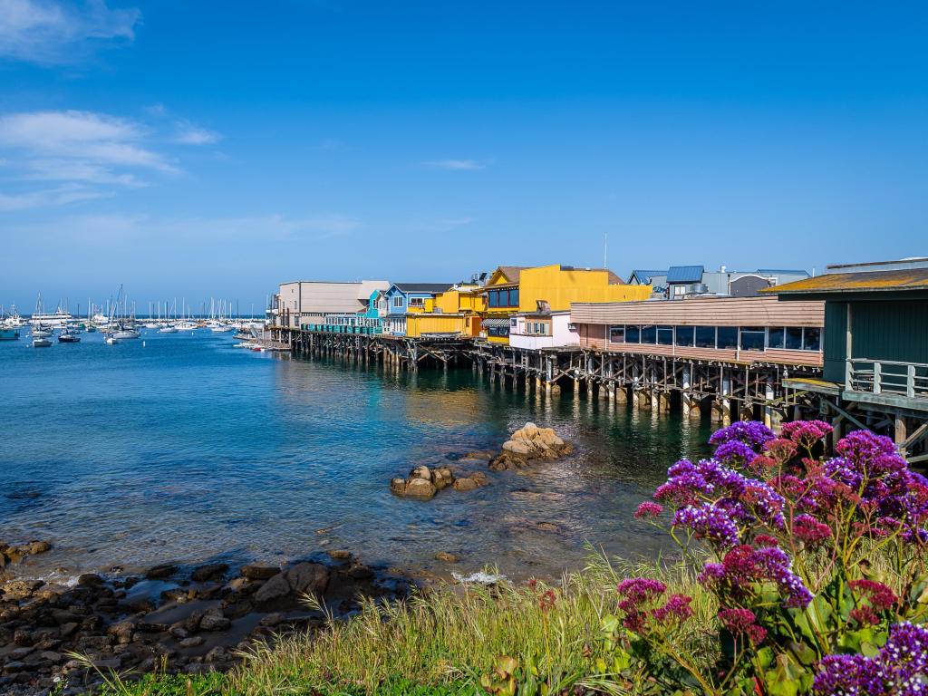 Colorful wooden buildings by the water in Monterey Bay, California
