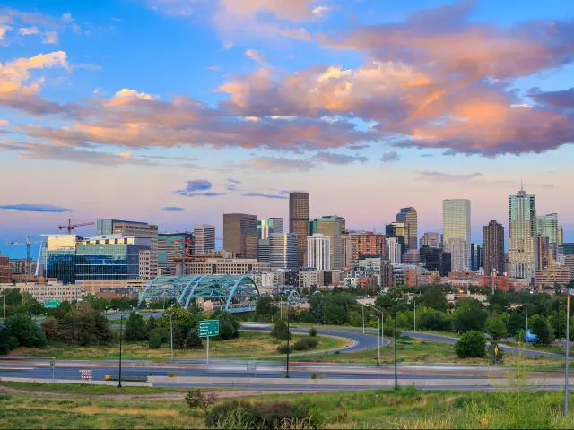 Denver, Colorado, USA with a panorama of Denver skyline long exposure at twilight.