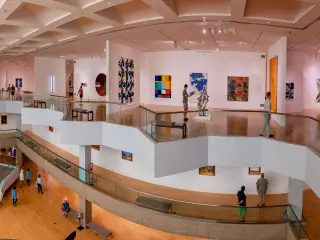 Tourists looking at art inside the Palm Springs Art Museum