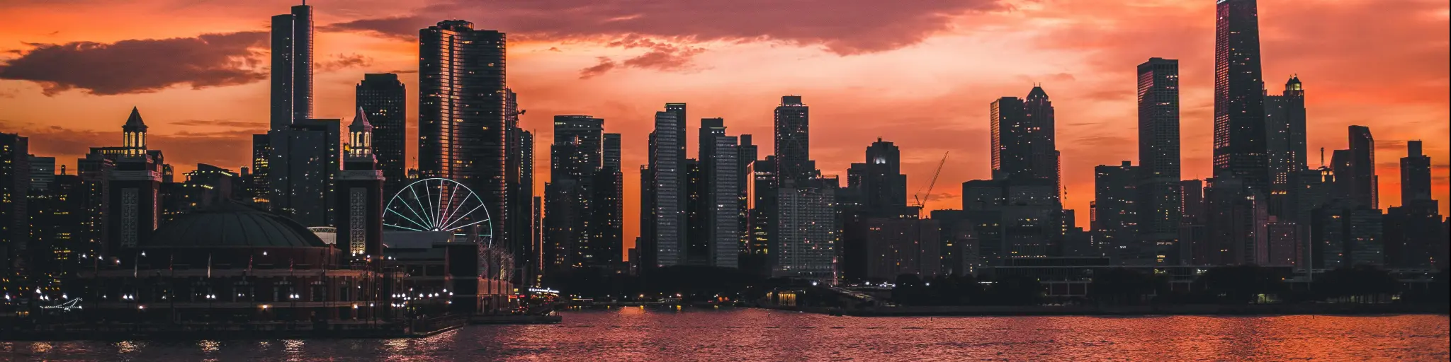 Chicago, USA taken at sunset from Lake Michigan in the foreground. 