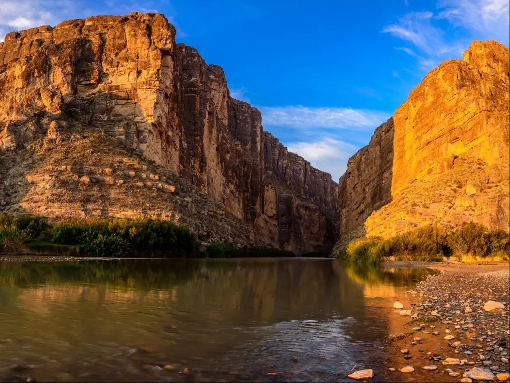 Santa Elena Canyon at Big Bend National Park, Texas, USA with the sunset behind the canyons in the distance. 