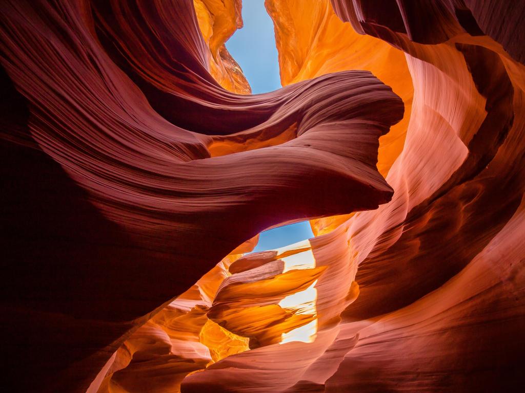Antelope Canyon, Arizona with a wide angle of amazing sandstone formations in Antelope Canyon on a sunny day.