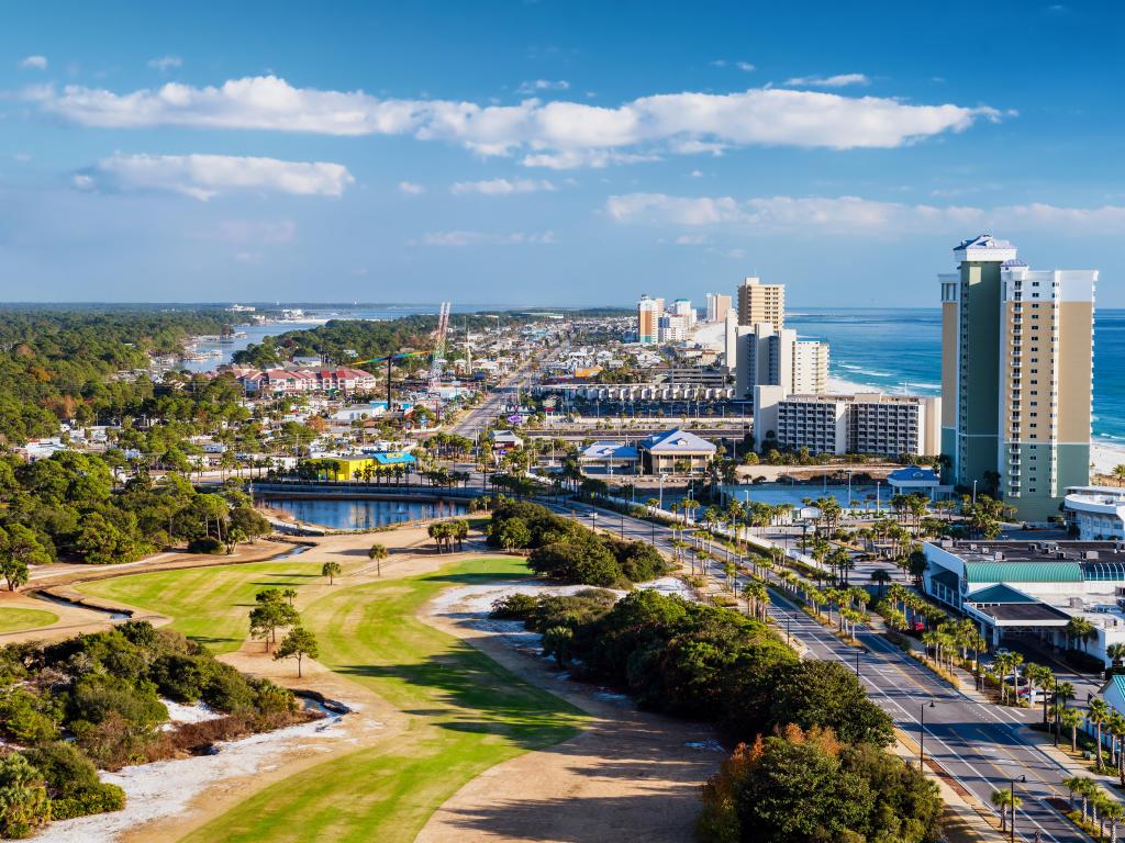 Panama City Beach, Florida, USA with a view of Front Beach Road on a sunny day.