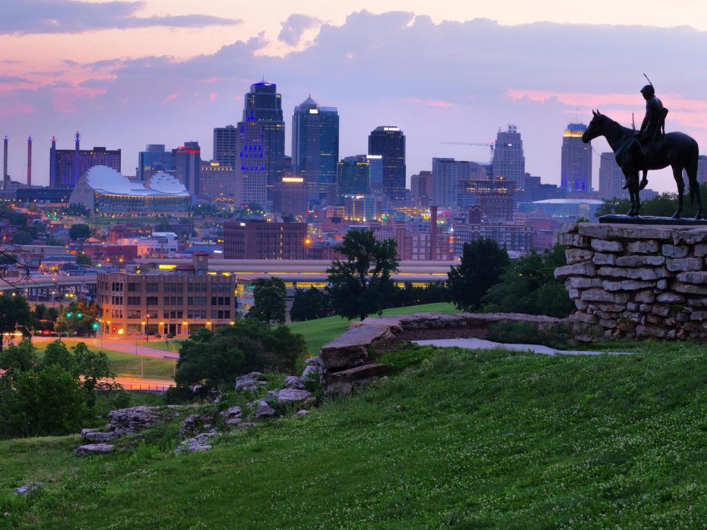 Kansas City Scout Memorial with a view of Kansas City, Missouri skyline at dawn 