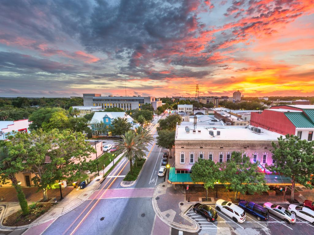 Gainesville, Florida, USA with the downtown cityscape at dusk.