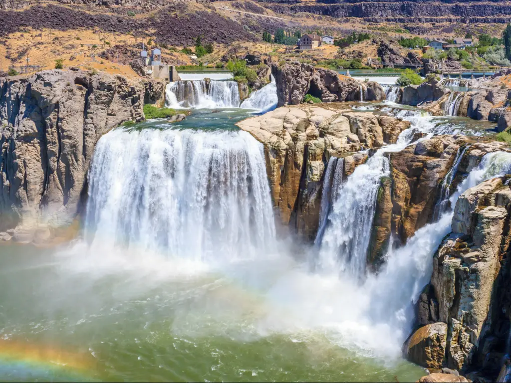 Twin Falls, Idaho with several dramatic waterfalls in the foreground and smaller ones in the background. 