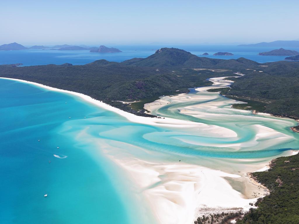 Aerial View of the Whitsunday Islands off the Australian Coast with white sands and clear turquoise waters