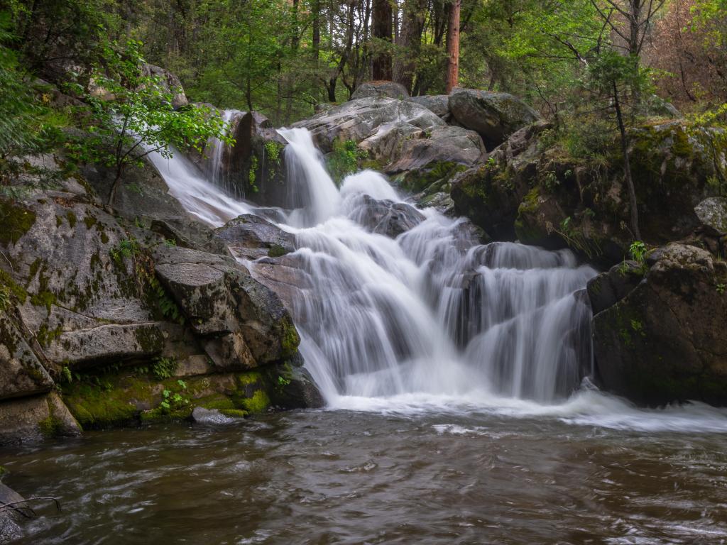 Beautiful Waterfall on the Lewis Creek Trail in California among lush trees