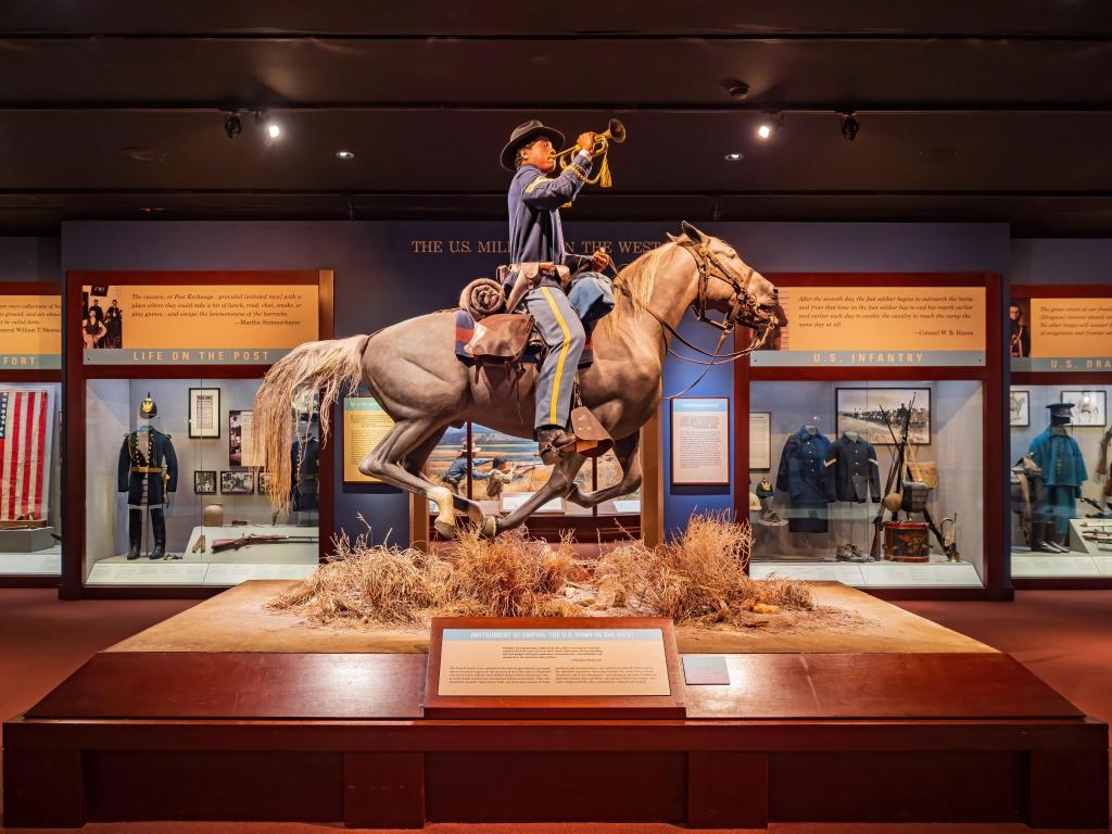Life-size figure of a US ranger riding a horse in the museum located in Oklahoma City