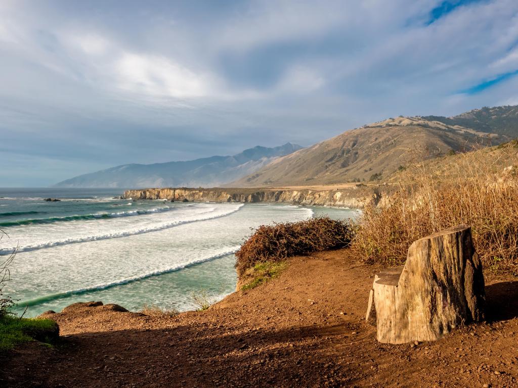 Sand Dollar Beach, Big Sur, California, USA with a view of the Pacific coast and cliffs in the distance.