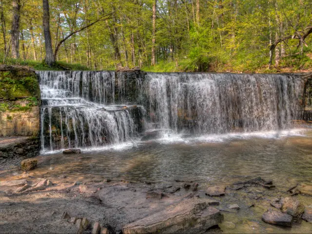 Big Woods State Park, Minnesota, USA with a great waterfall and trees behind.