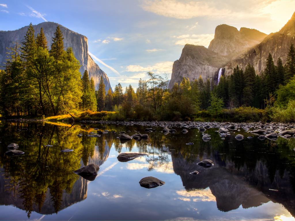 View of Yosemite Valley at sunrise from the Merced River, California.