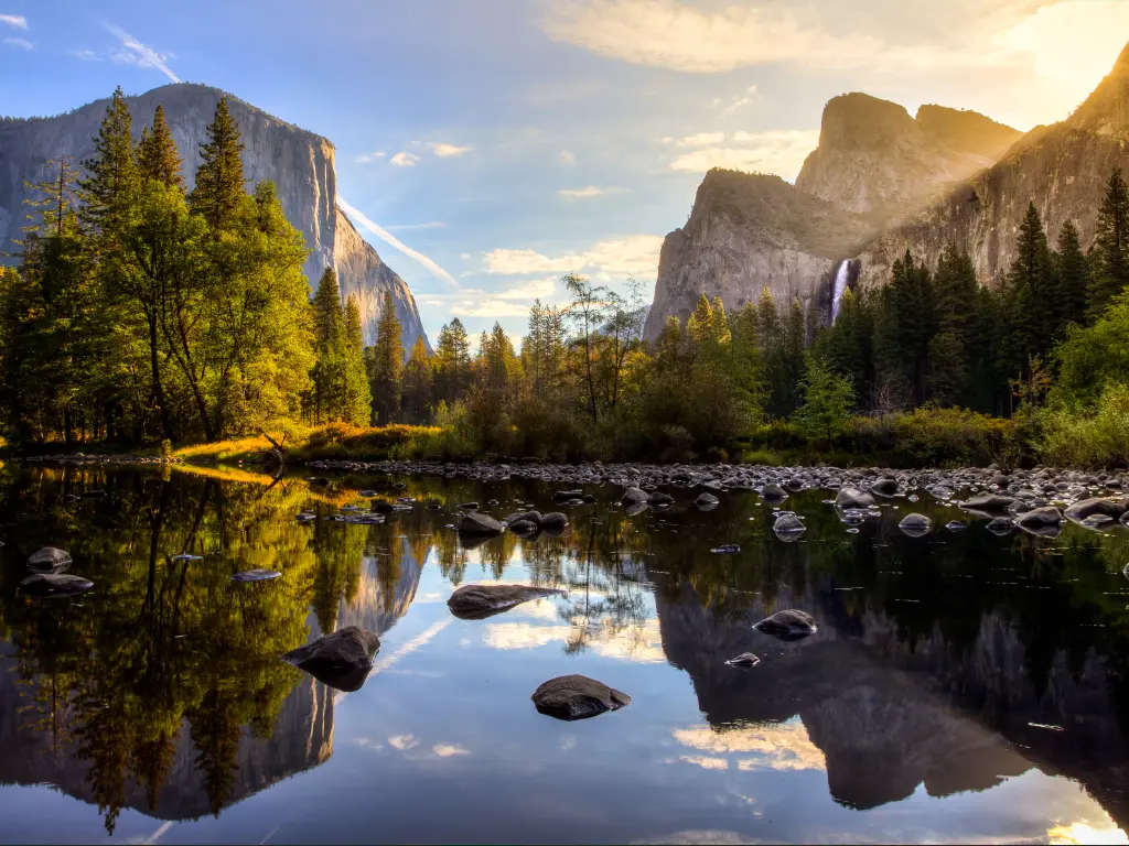 View of Yosemite Valley at sunrise from the Merced River, California.