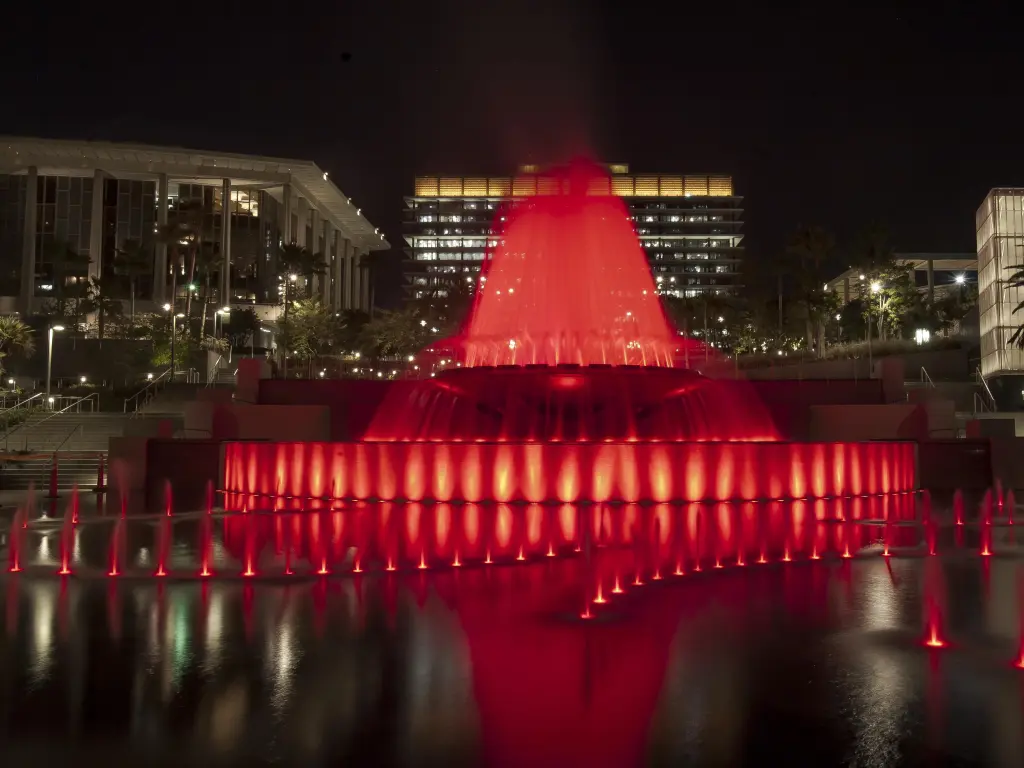 Night view of Grand Park Fountain Los Angeles, with bright red lighting across the fountain